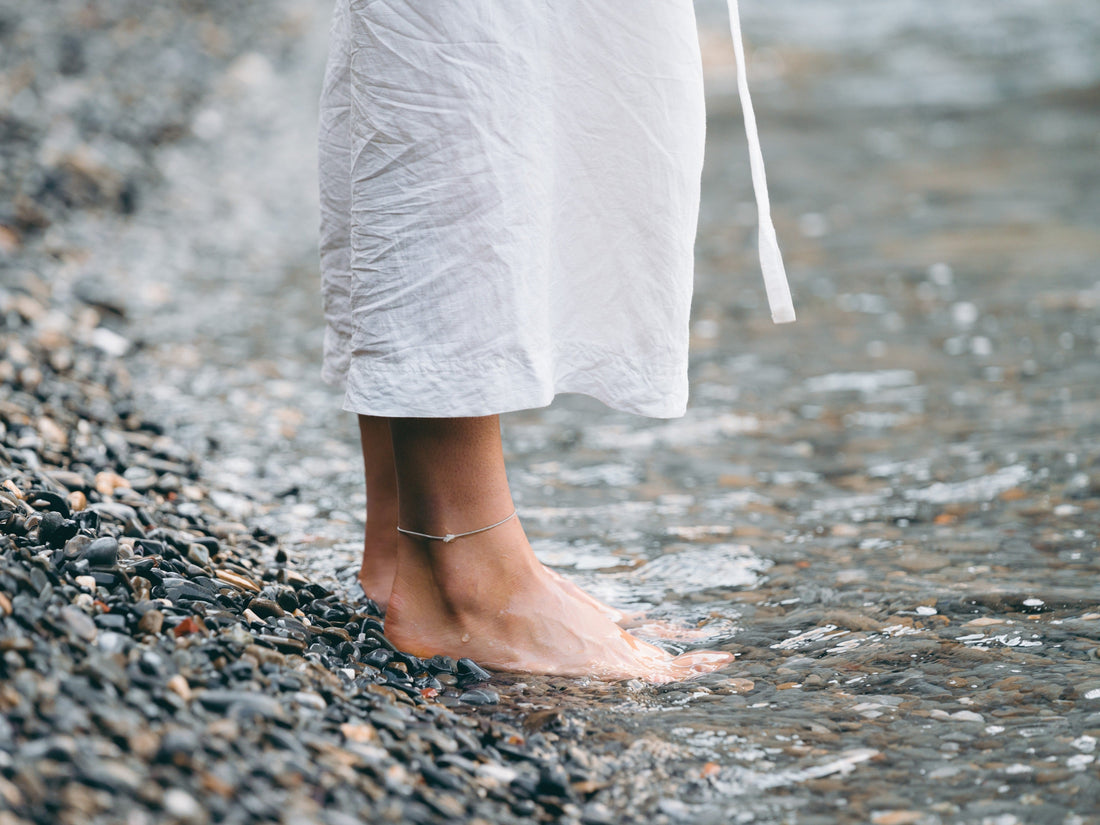 Women's feet on ground.  Power of Grounding